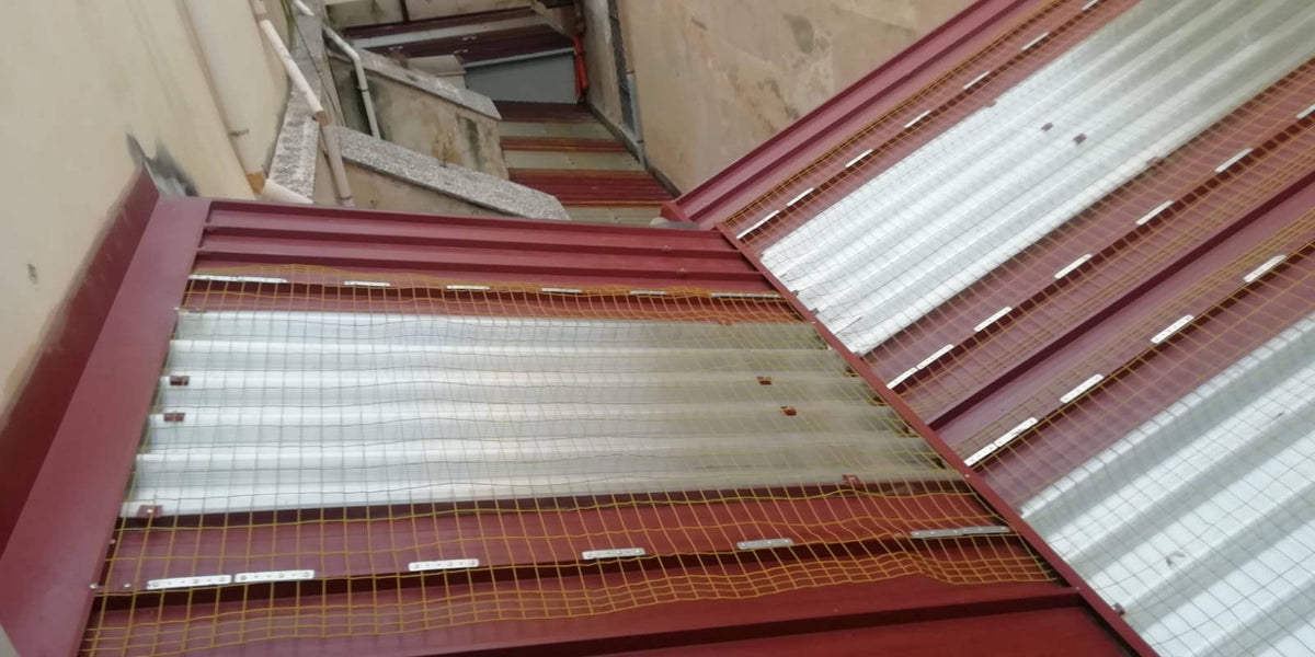 Pasini MESSA IN SICUREZZA LUCERNARI CON RETE SAFETY HI-VIS 1200J